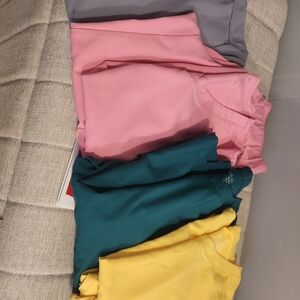 Med Couture Vibrant Scrub Tops in Pink, Teal, Yellow, and Gray